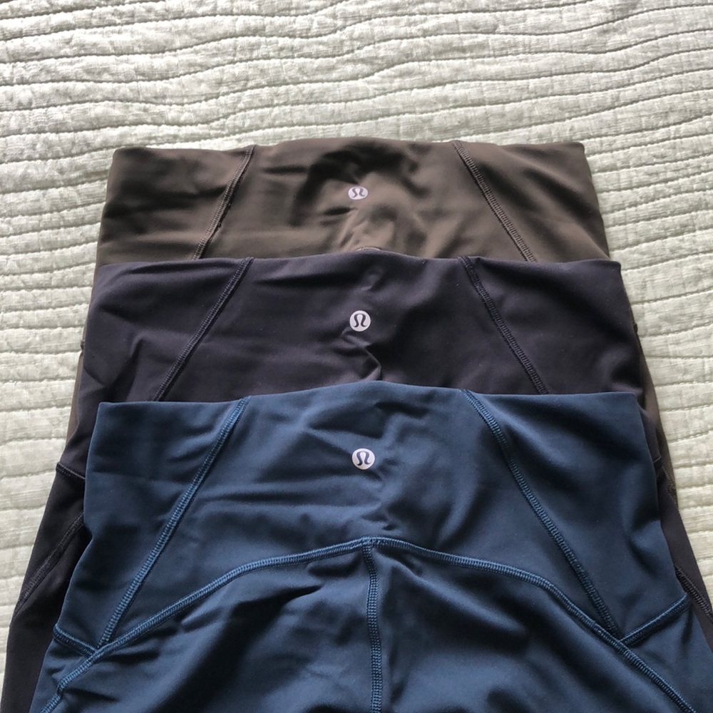 Three pairs of Lululemon Train Times 7/8 leggings